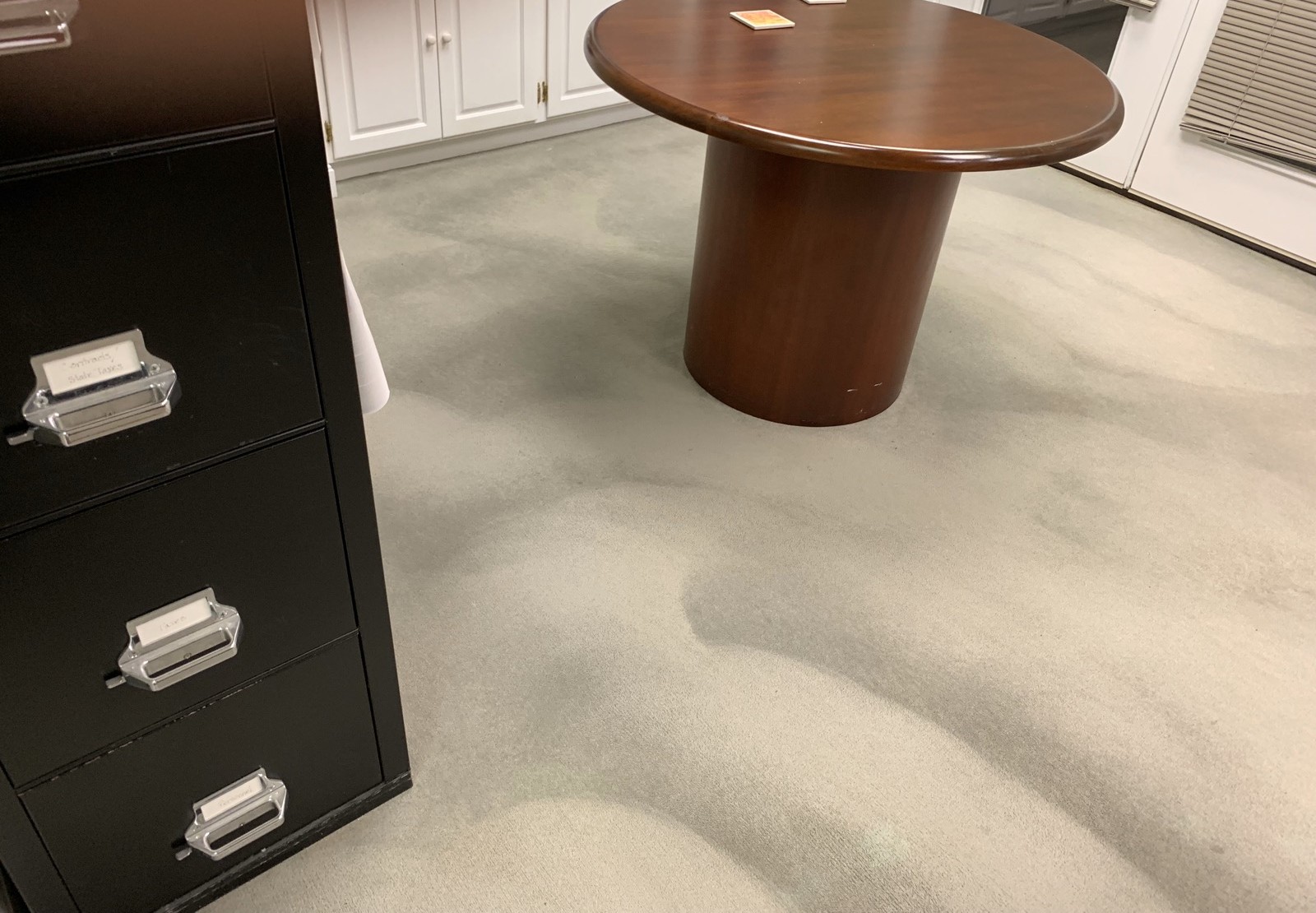 Freshly vacuumed office carpet with visible clean lines
